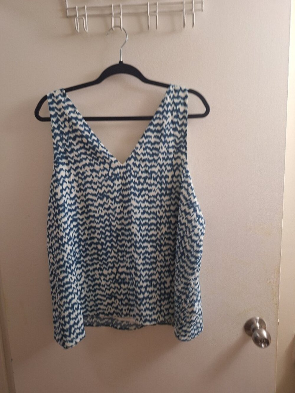 REITMAN'S TOP NEW.
